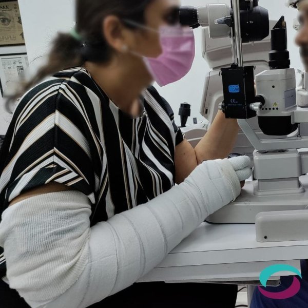 lady working with wrapped arm.jpg lady working with wrapped arm.jpg